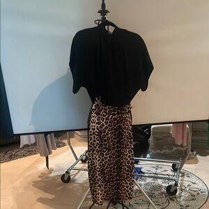 Animal print skirt set. Midi Wrap Pencil Skirt with bowback blouse. Great look